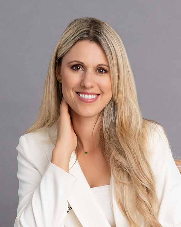 Studio-lit headshot of Kasia Jeffery at Rose + Salt Studio, captured by J. Hill Photography with a clean, modern background and professional styling.