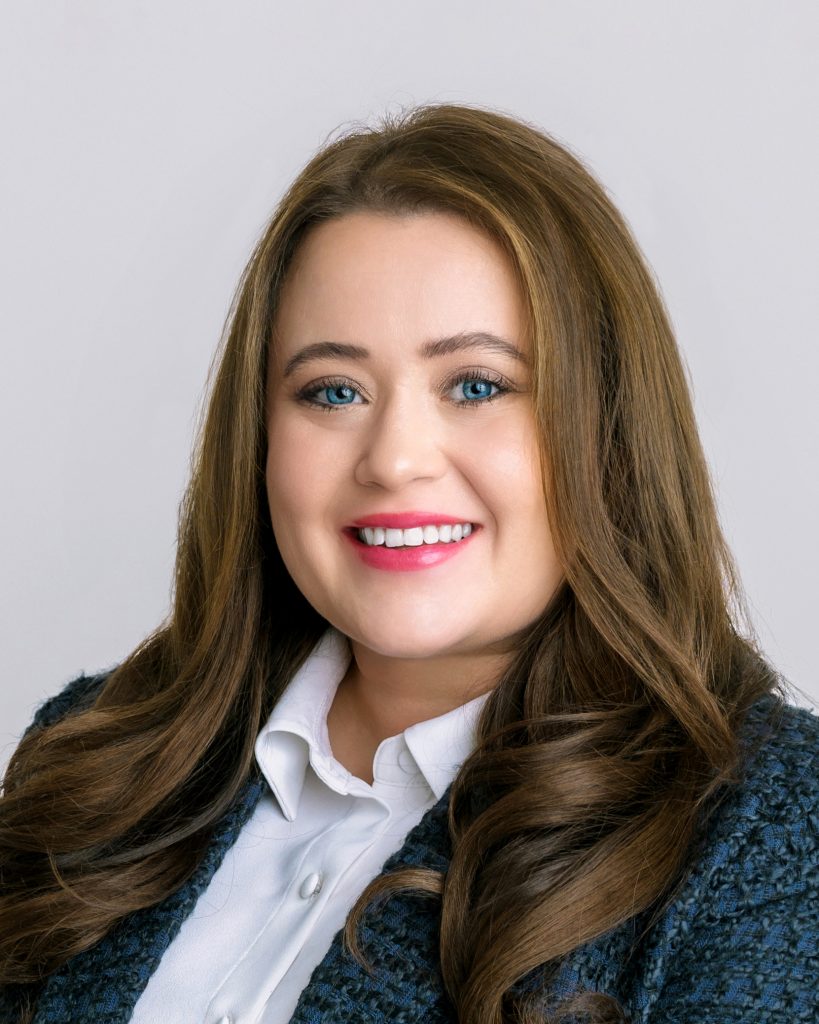 Crisp, professional headshot of Leslie Jones at Rose + Salt Studio using studio lighting and a minimalist backdrop for a modern, refined look.