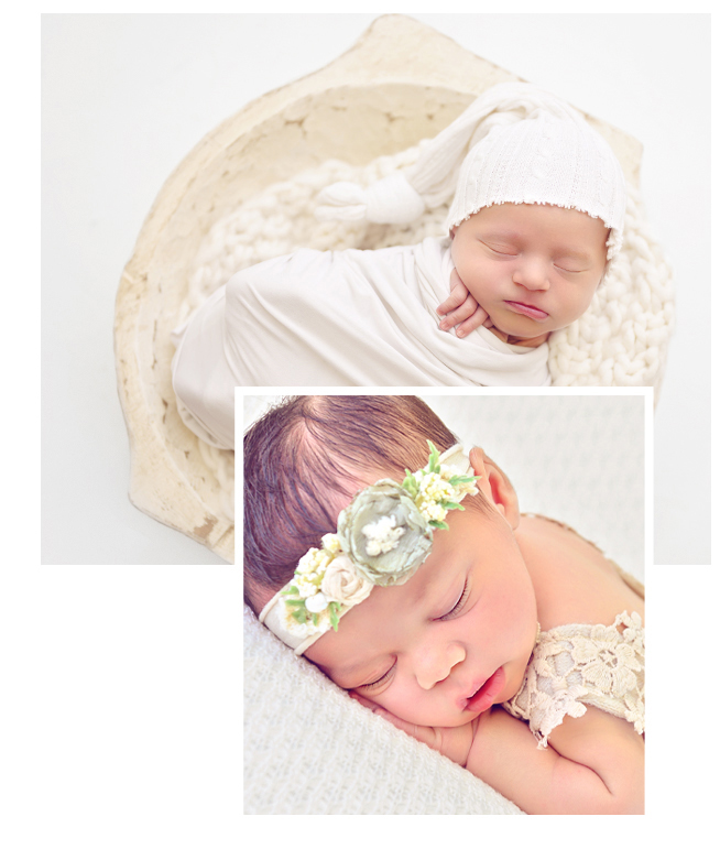 A newborn wrapped in white in a white wooden bowl.  