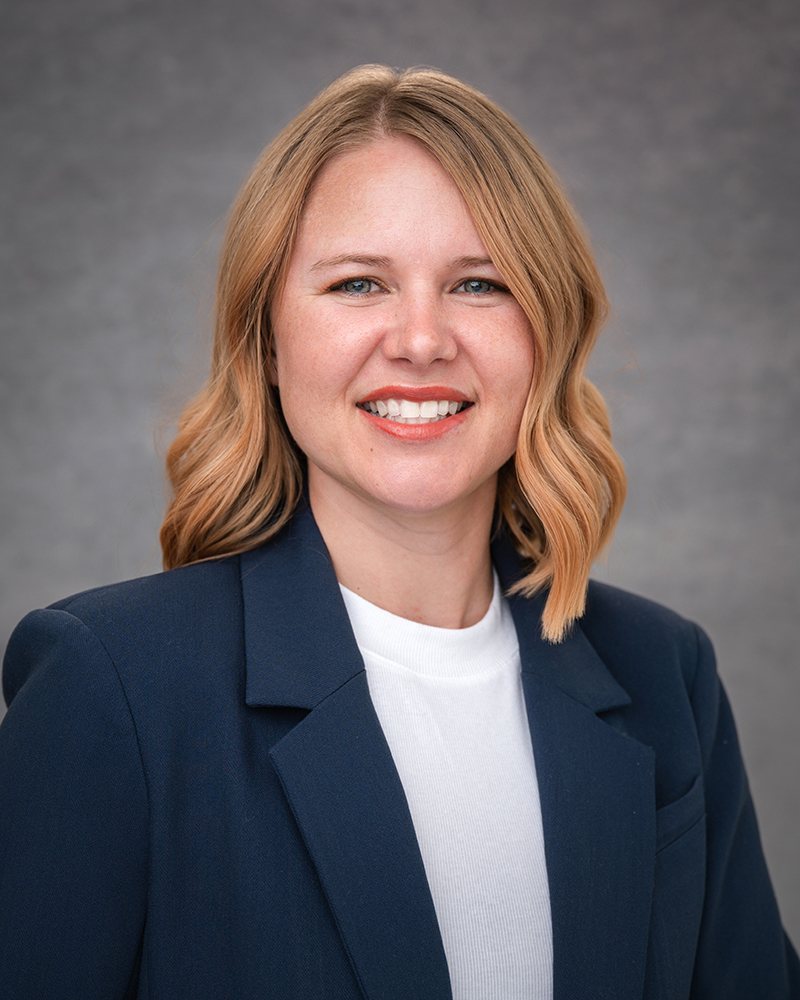 Professional headshot of Gabrelle Sharp, associate attorney at Wallis Law Group, focusing on estate law, business formation, and guardianships.