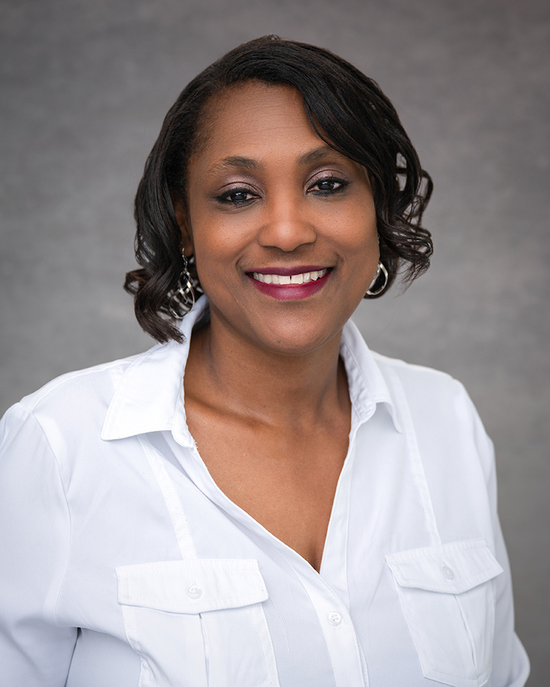 Headshot of Lashae Hayden, paralegal at Wallis Law Group in Oklahoma, supporting estate planning, trust administration, and probate cases.