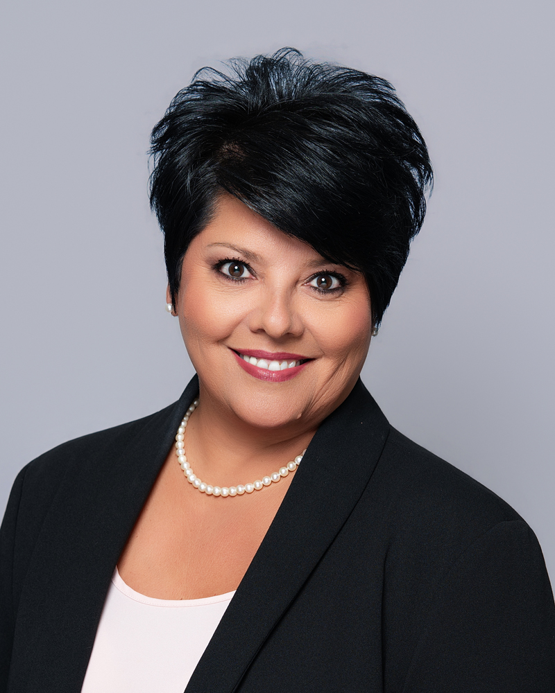 Photographer creating professional headshots at a company office in Oklahoma City