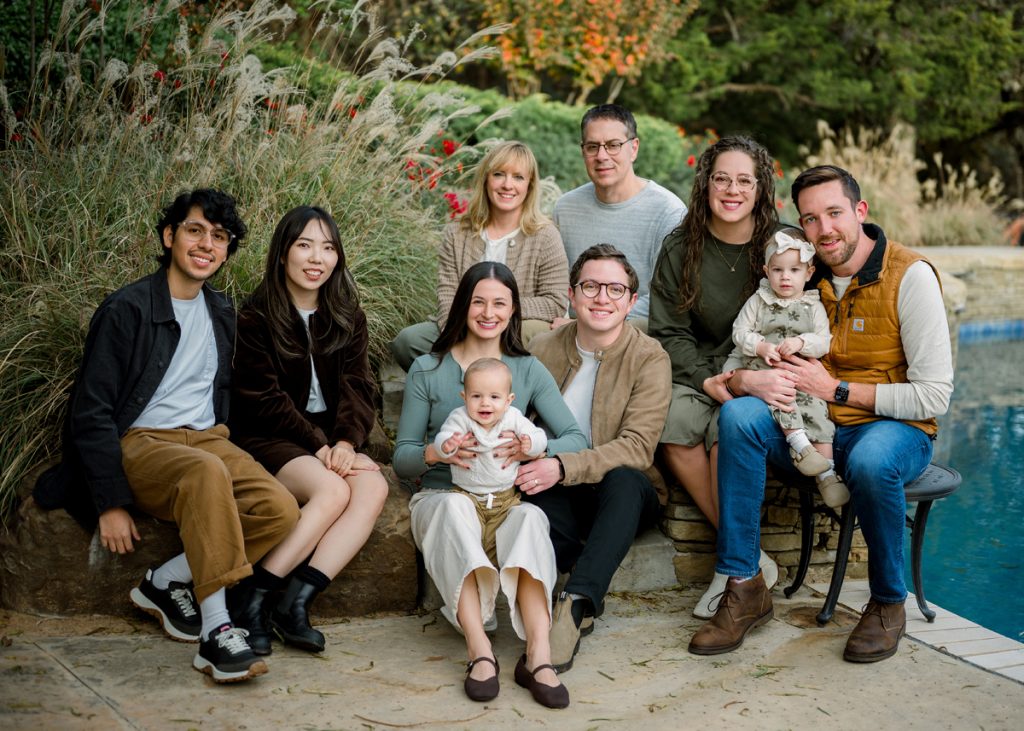 Multi-generational family gathered together for an outdoor portrait session in Edmond Oklahoma.